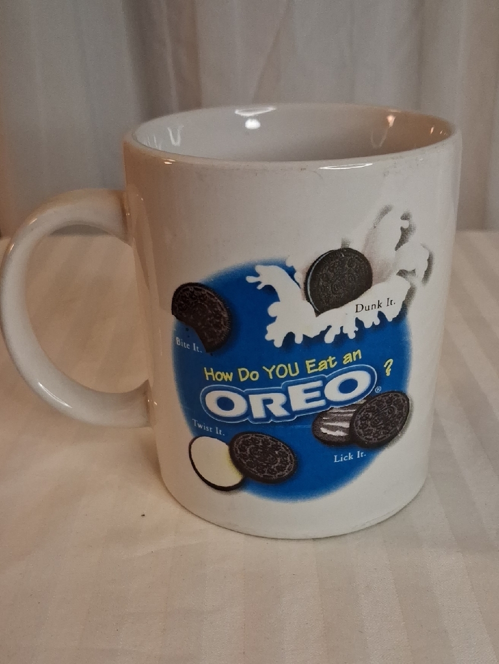 White Ceramic Mug with Blue Logo